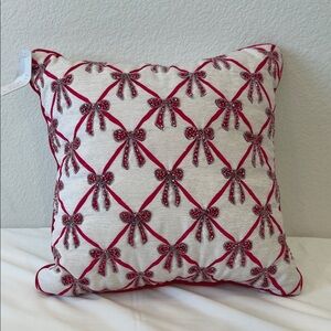 Festive Red and White Bow Holiday Pillow